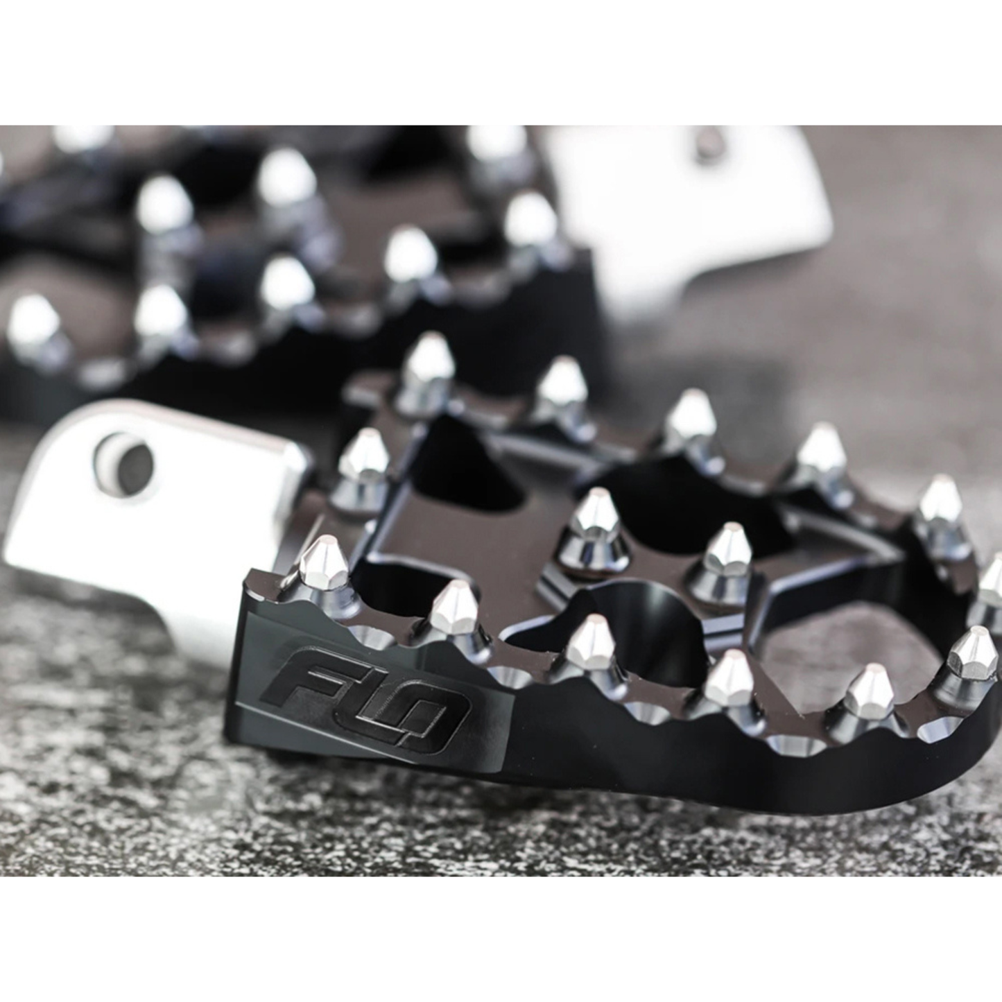 Flo Motorsports - V2 MX Footpegs – Black. Fits Softail 2018up Front Rider